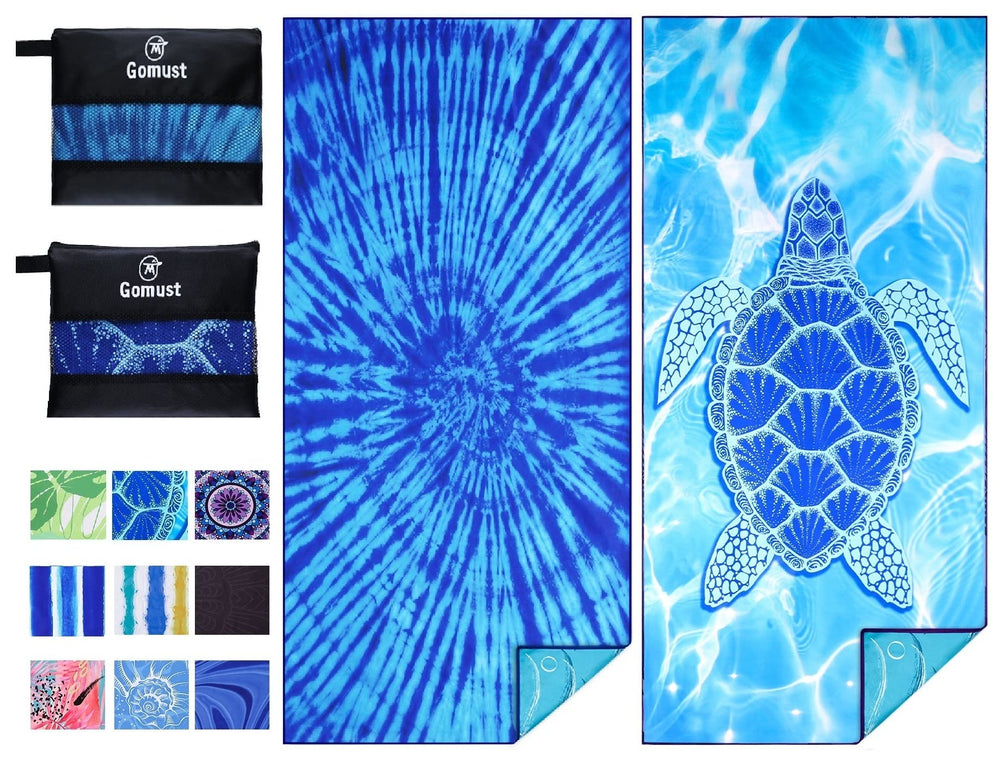 Gomust 2-pack beach towels 71x32 blue tie-dye laid flat for poolside setup.