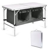 Goplus folding camping table with storage, compact when folded for easy transport and setup.