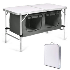 Goplus folding camping table with storage, compact when folded for easy transport and setup.