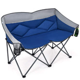 Goplus Loveseat Camping Chair with two adults sitting, ideal for shared outdoor lounging.