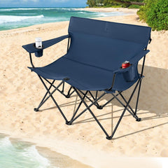 Goplus loveseat camping chair with X-frame for sturdy stability on uneven ground.