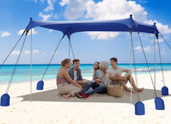 Gorich beach tent with eight sandbags providing stable windproof shade at the coast.