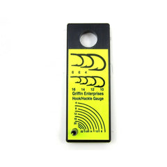 Griffin Hook and Hackle Gauge on bench helps select precise hook sizes for tying.