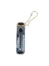 Grim Workshop Handcuff Shim Micro Tool on a keychain for ultra-light portability.