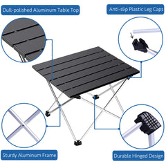Grope portable camping table on beach demonstrates stable dining on sand.