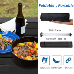 Grope portable camping table set on picnic setup for outdoor meals.