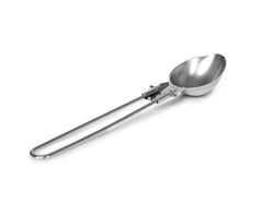 GSI Outdoors Folding Chef Spoon on the go, highlighting compact storage for travel.