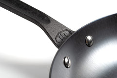 GSI Outdoors Guidecast 12-Inch Frying Pan on stove top for home cooking
