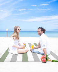 Gsypo beach blanket at 84x80 inches offers ample space for family gatherings.