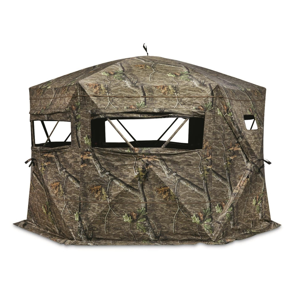 Guide Gear Educator blind exterior with large windows offering 360-degree visibility for hunting.