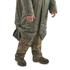 Guide Gear bag with hood and drawcord seals in warmth during chilly mornings.