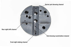 Features including spring removal recess and various channels