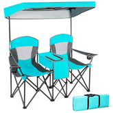 GYMAX double camping chair with navy canopy provides shaded comfort by the water.