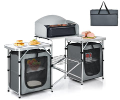 GYMAX folding camping table with aluminum top, ideal for outdoor cooking.