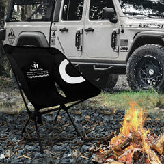 Hailanbao folding chair sturdy frame highlights aerospace-grade aluminum stability on uneven ground.