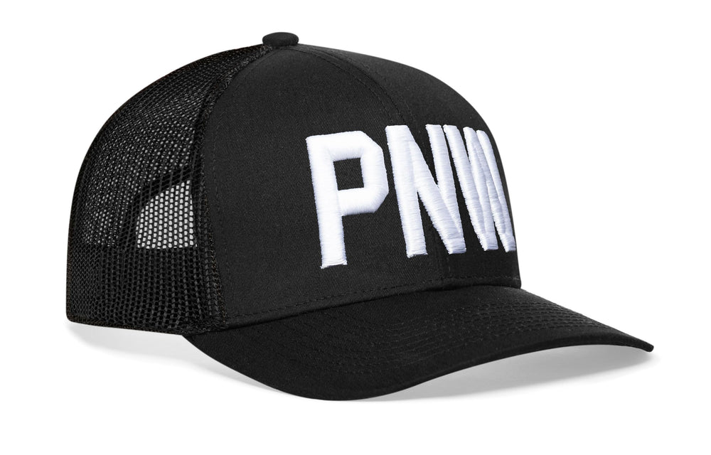 HAKA PNW Black Trucker Hat front view with bold embroidery for lasting style.