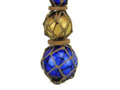 11-inch glass buoy displayed as wall art in home or office