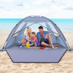 Happy Travel beach tent setup shows quick, easy assembly for family beach days.