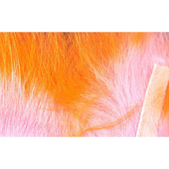 Hareline Crosscut Rabbit Flesh Strips Two Tone in salmon pink orange, enhances streamer motion