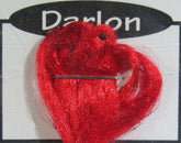 Hareline Darlon Bright Red closeup reveals vivid color for lifelike fly bodies.