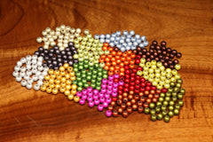 Hareline Dubbin 3D Beads Olive for articulated flies, enhancing balance and action