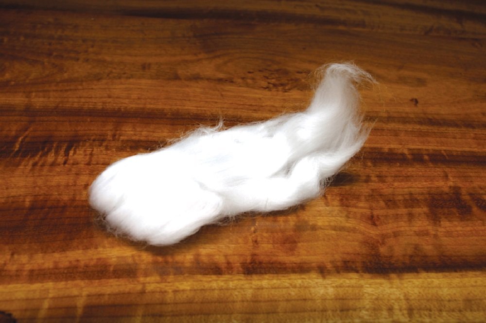 Hareline Dubbin Egg Veil Milky White finishes egg flies with fine texture for glow bugs.