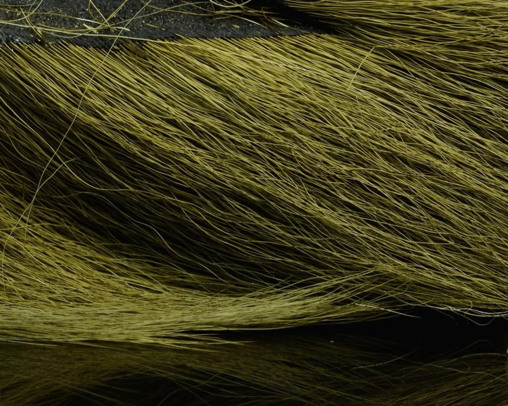 Hareline Dubbin Large Northern Bucktail olive for versatile trout fly tying.