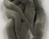 Hareline Dubbin Mangum's Mini Dragon Tail UV2 treated in gray; precise streamer action