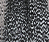 Hareline Dubbin Micro Barred Voodoo Fibers show classic black and white barred finish for small streamers.
