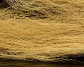 Hareline Dubbin Northern Bucktail tail collection closeup shows natural hair and rich colors for lifelike flies