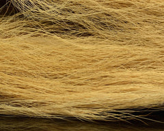 Hareline Dubbin Northern Bucktail tail collection closeup shows natural hair and rich colors for lifelike flies