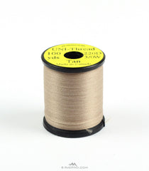 Hareline Dubbin Uni 3-0 waxed thread spool for durable, flat fly tying on hooks.