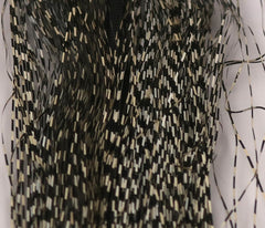 Hareline Dubbin Voodoo Fibers micro-barred black tan closeup highlighting lifelike flash