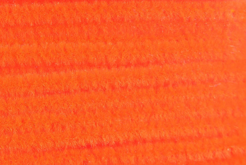 Hareline Dubbing Chenille in fluorescent fire orange adds buggy realism for streamers and nymphs