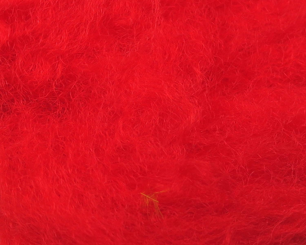Hareline Dubbing Rams Wool-Red packaging shows natural fibers ideal for durable dubbing.