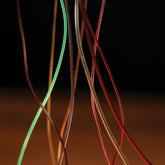 Hareline hollow tubing peach closeup for precise nymph ties