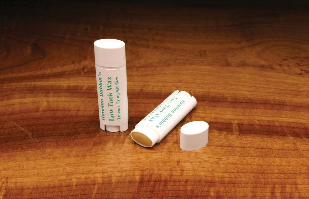 Hareline Low Tack Dubbing Wax oval tube helps control thread during fly tying.