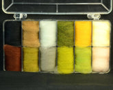 Hareline Superfine Dry Fly Dubbing dispenser showing 12 color compartments for organized dubbing