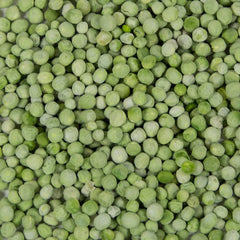 Harmony House freeze-dried whole peas jar close-up, vibrant greens rehydrate quickly for soups and stews.