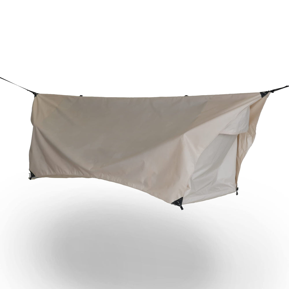 Haven Tents Safari lay-flat hammock-tent setup for restful sleep in a sheltered campsite.