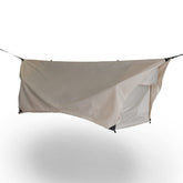Haven Tents Safari lay-flat hammock-tent setup for restful sleep in a sheltered campsite.