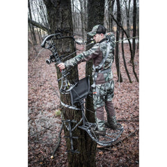 Hawk Cruzr tree-digger teeth secure mounting on bark during hunts.