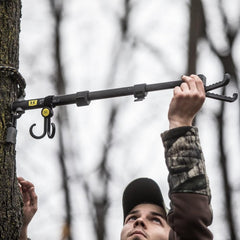 Dual silent-grip hooks on Hawk Mega Arm secure bow and gear quietly