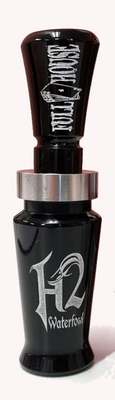 Haydel's H2FH Full House duck call closeup in black acrylic, windy marsh readiness.