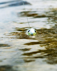 Heddon Super Zara Spook Rupture 4.5 inch close-up on black nickel hooks.