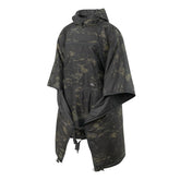 Helikon-Tex Swagman Roll Poncho black worn for rugged outdoor protection.