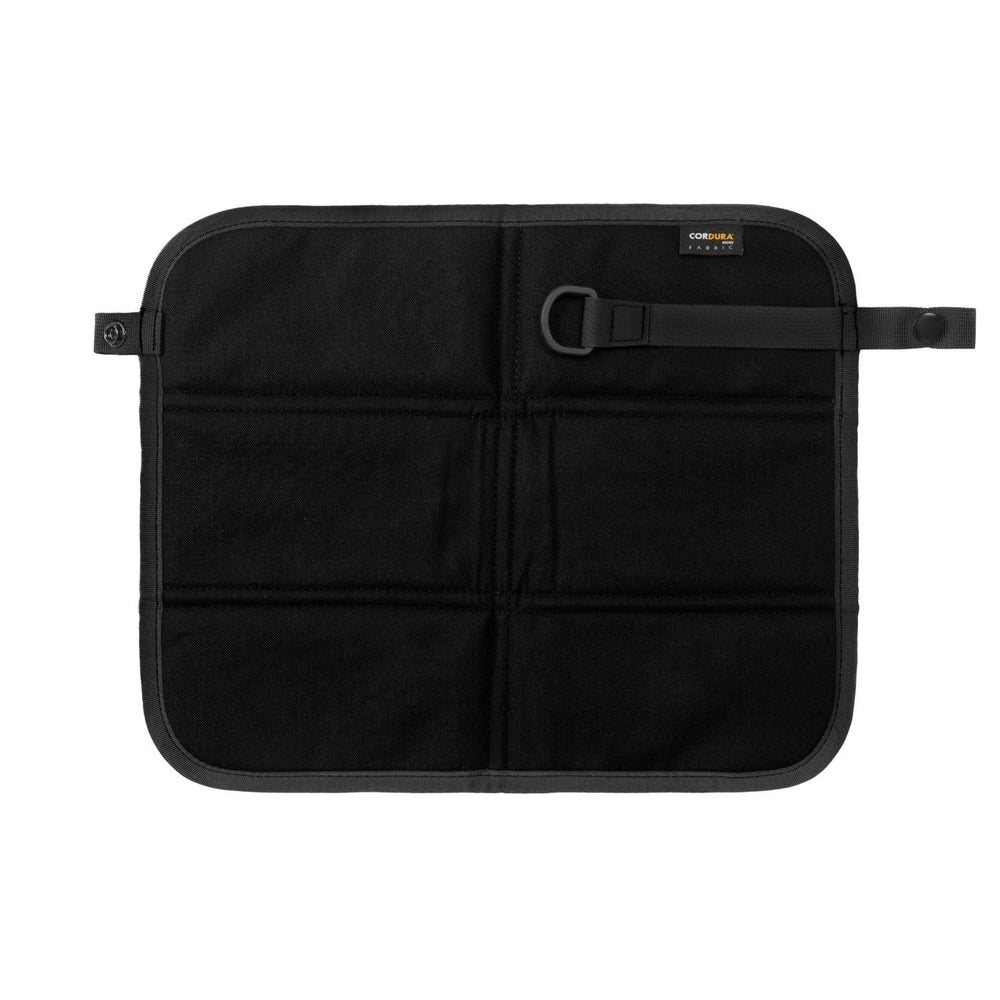 Helikon-Tex Vagabond Seat Pad folded for compact carry during outdoor trips.