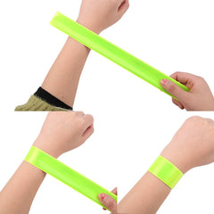 HEQUSigns reflector snap band worn on the ankle enhances visibility for runners at dusk.