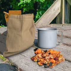 Hide & Drink foraging pouch collapsed flat fitting in pocket.