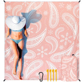 HIHOHO Beach Blanket spread on sand showing roomy coverage for a small group